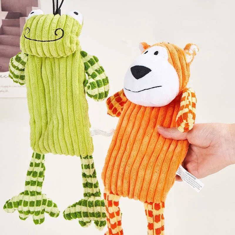 Green and orange immortal squeaker plush dog toy for aggressive chewers with dental cleaning surface