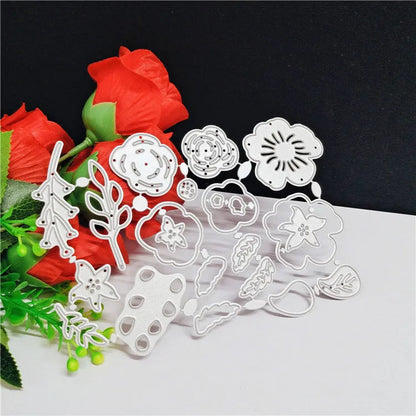 Silver carbon steel floral cutting die for paper crafts measuring 14.3 by 9.9 cm.