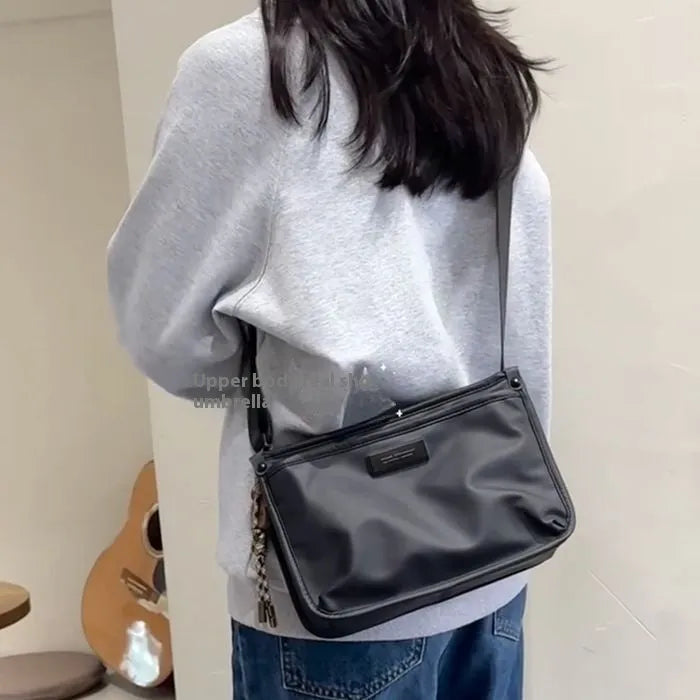 Small square Oxford cloth crossbody bag in trendy cool colour for leisure travel