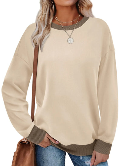 Loose fit striped long sleeve top for women on a hanger, shown in apricot colour.