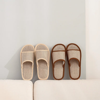 Women's open-toe linen slippers with thick sole in light brown colour.