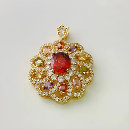 Close-up of a women's flower-shaped pendant necklace with a colourful zircon stone in a choice of gold, champagne gold, or platinum colour finishes.