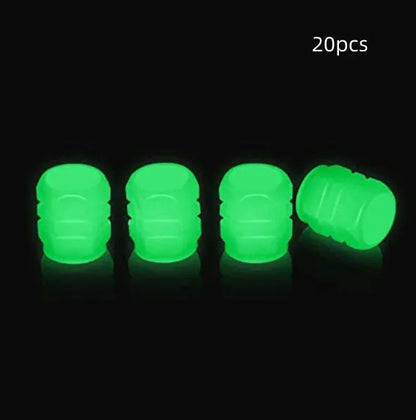 Glow-in-the-dark rubber tyre valve caps in five colour options on tyre valve stem