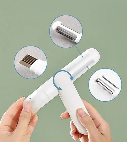 White multifunctional rotary kitchen peeler with stainless steel blade and ergonomic PP handle.