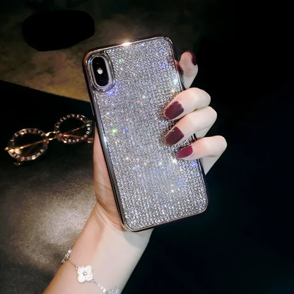 Silver full diamond silicone phone case for iPhone, showing camera and button cut-outs.