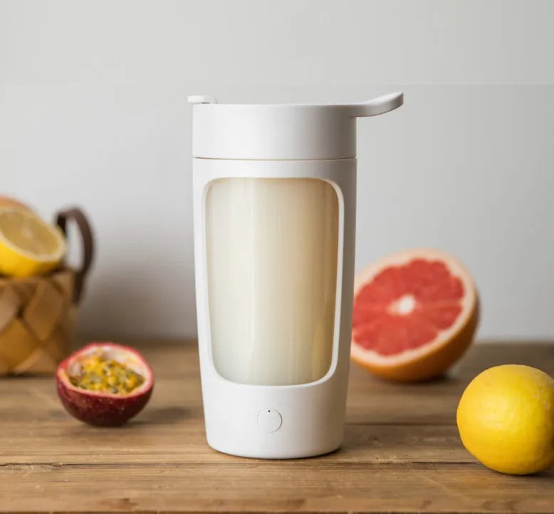 Portable juice blender in blue colour showing 650ml capacity markings and USB charging port