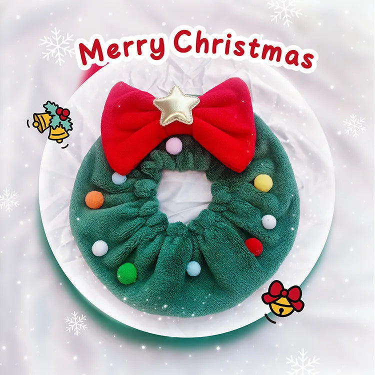 Red bow-knot Christmas pet scarf with colourful fuzzy balls on a dog, showing floral pattern and adjustable fit.