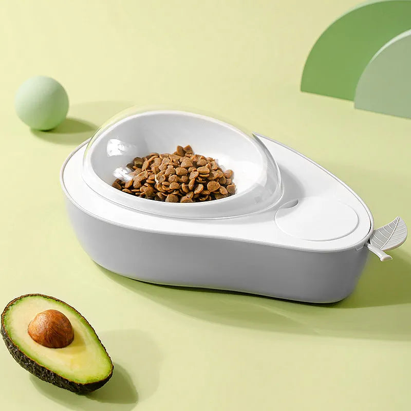 Avocado-shaped pet feeder with automatic water dispenser bottle and slow feed bowl in green colour