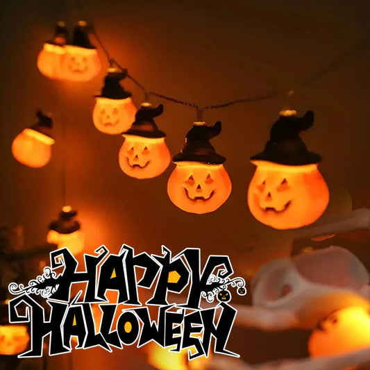 Battery-powered LED Halloween lights in various spooky designs including pumpkins, ghosts, and bats with warm white glow