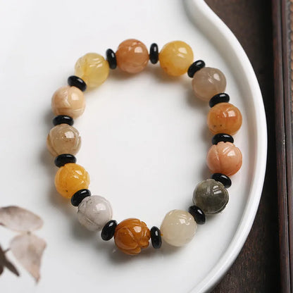 Hetian Natural Jinsi Jade pumpkin beads bracelet with geometric shape and auspicious patterns.