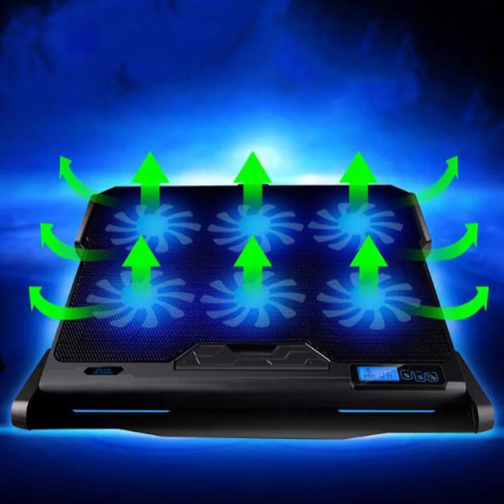 Metal mesh laptop cooling board with LCD display showing speed settings, positioned beneath a notebook computer