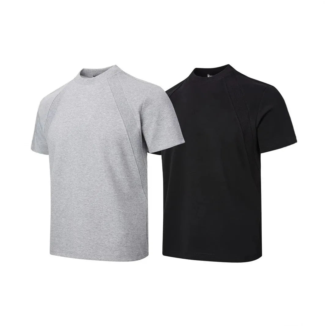 Loose-fit black short sleeve top with textured air layer stitching on a mannequin.