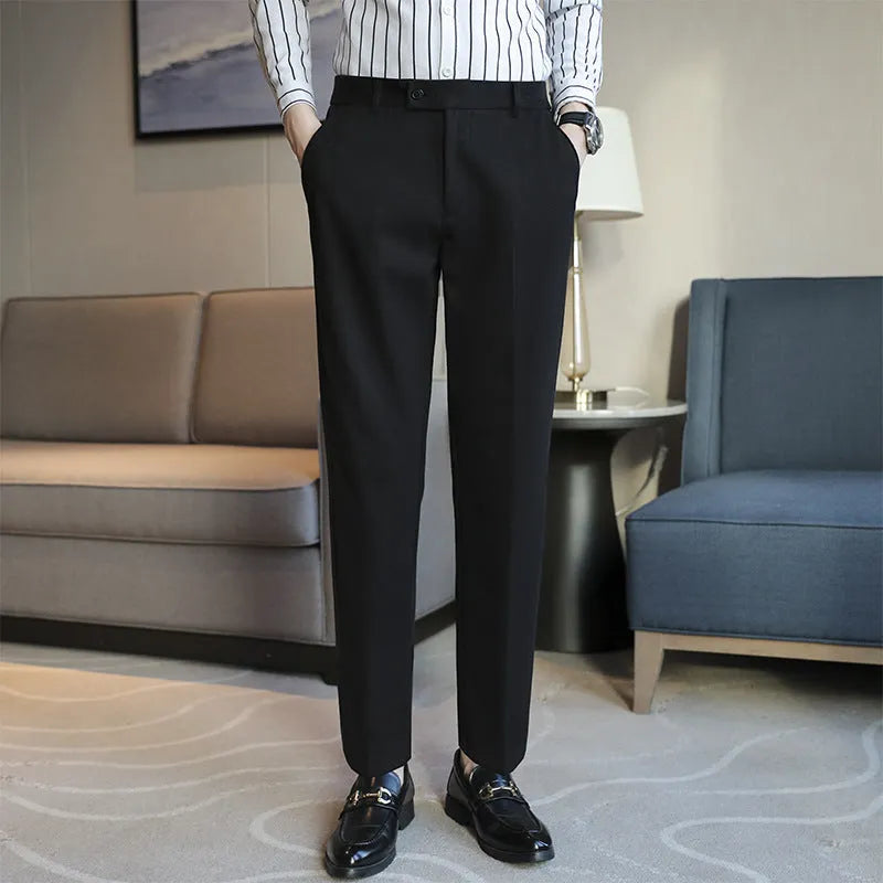 Straight-leg brown corduroy trousers with elastic waistband on size chart