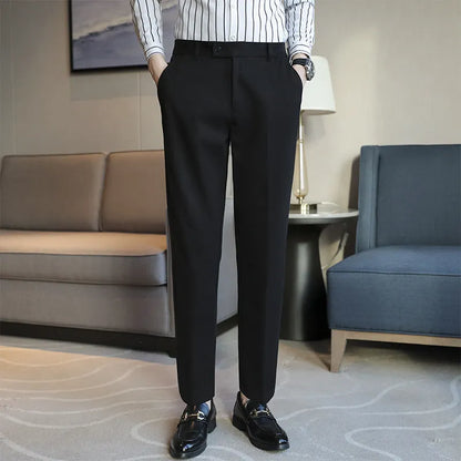 Straight-leg brown corduroy trousers with elastic waistband on size chart