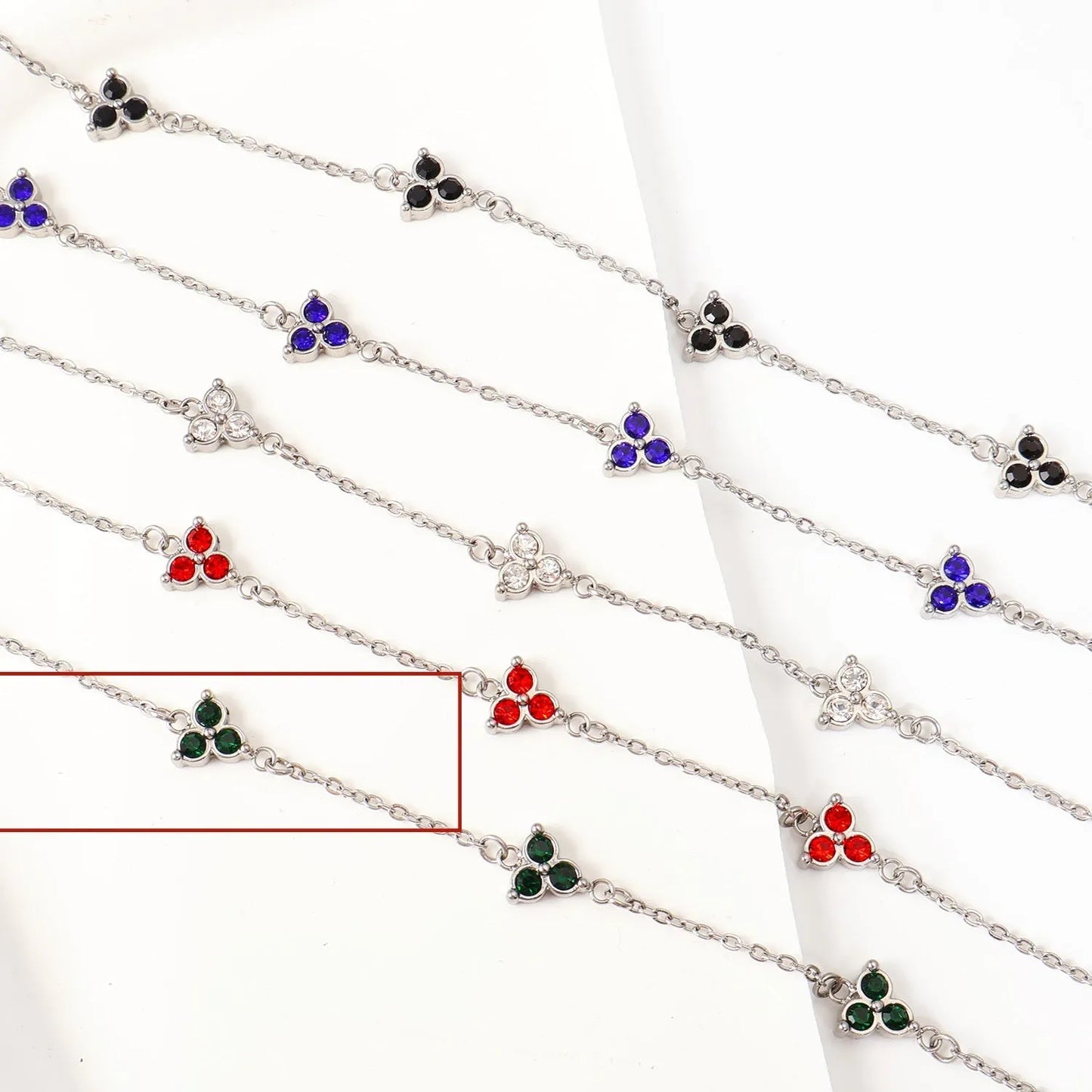 Women's stainless steel three diamond geometric triangular bracelet in gold finish with white zircon gemstones