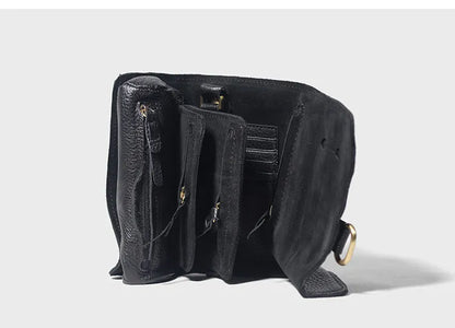 Handmade vintage leather wallet in black or dark brown with tape closure.