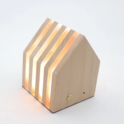 A warm, Scandinavian-inspired wooden LED night light in the shape of a heart or small house, providing cozy illumination for any room