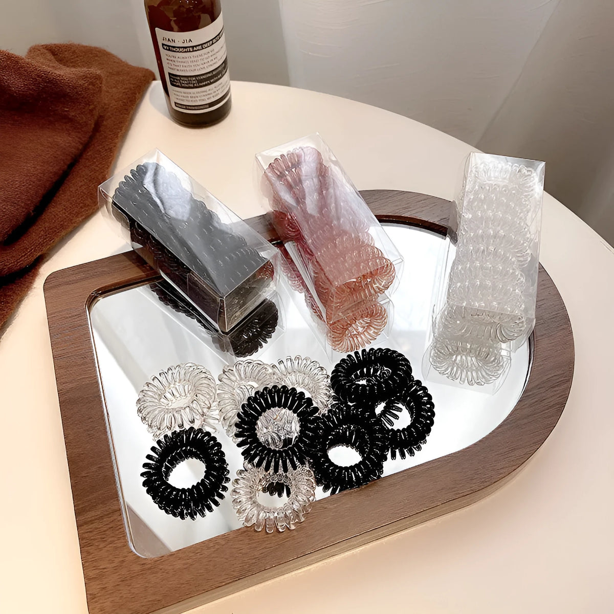 Set of 9 TPU traceless hairbands in various colours for phone cable organisation