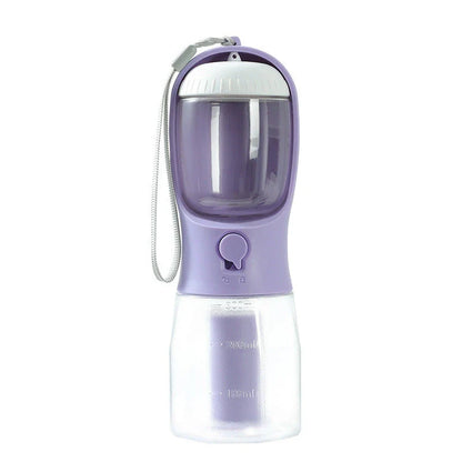 Portable 3-in-1 pet water bottle with built-in filtration system, food container, and waste bag storage compartment