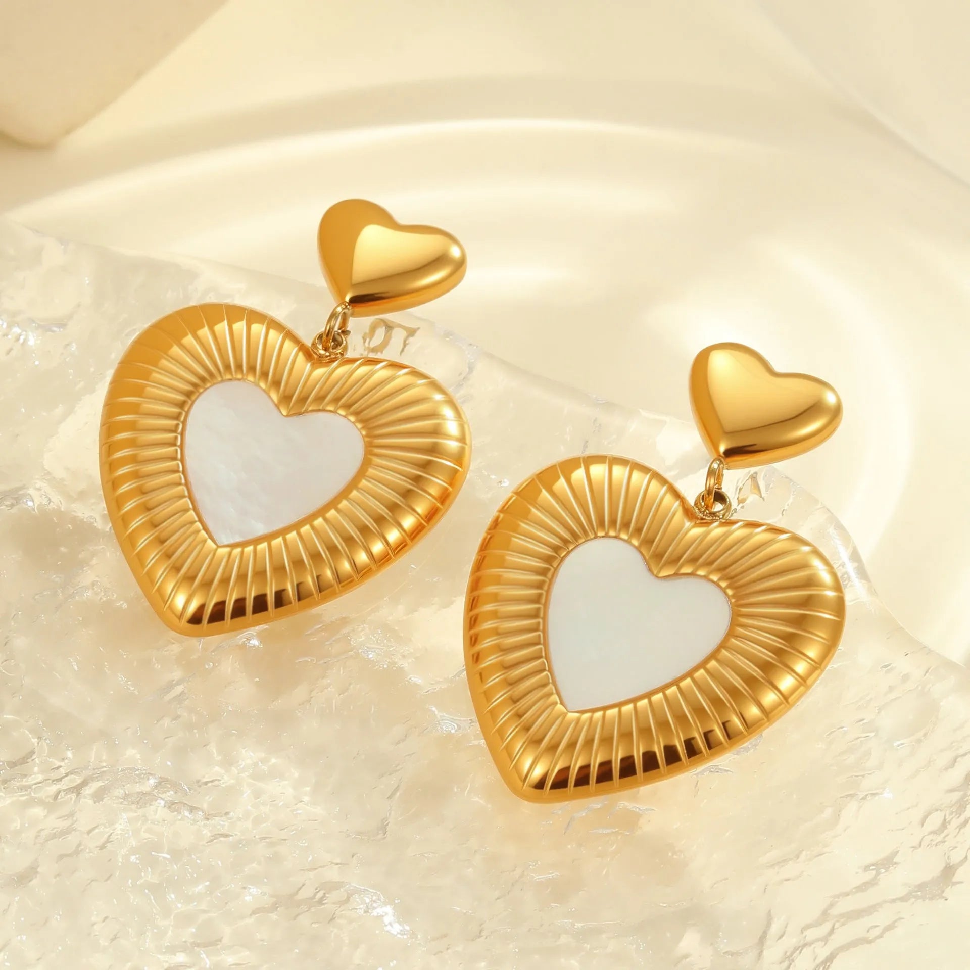 Women's gold heart fritillary earrings with stainless steel construction and 18K electroplating