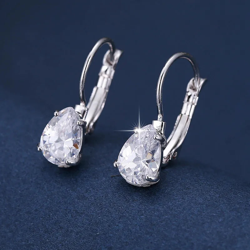 Women's copper drop earrings with gemstone inlay in gold or platinum finish
