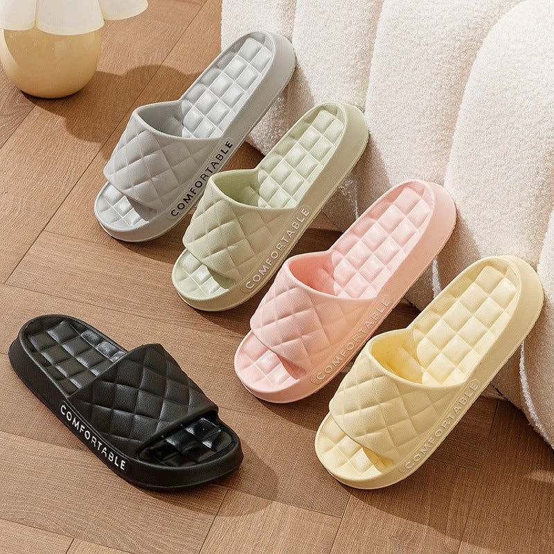 Stylish plaid slippers with soft, cushioned soles for comfortable indoor wear