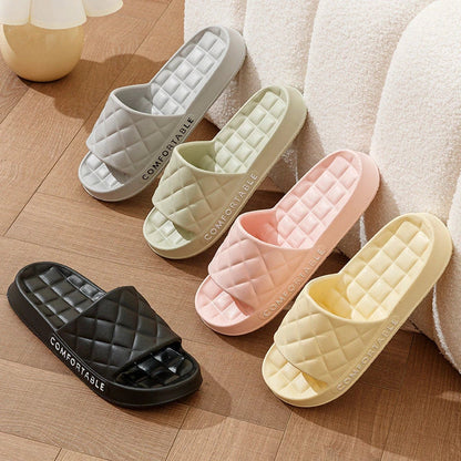 Stylish plaid slippers with soft, cushioned soles for comfortable indoor wear