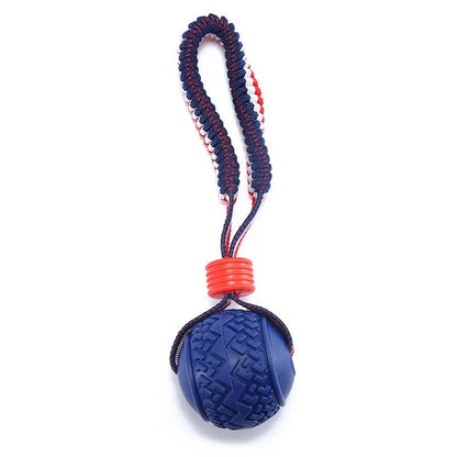 Blue dog ball with rope toy showing 6.5cm diameter textured rubber ball on 29cm rope for dental cleaning and tug-of-war