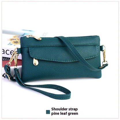 Soft surface square PU crossbody bag and clutch with internal zipper pocket in various colours.