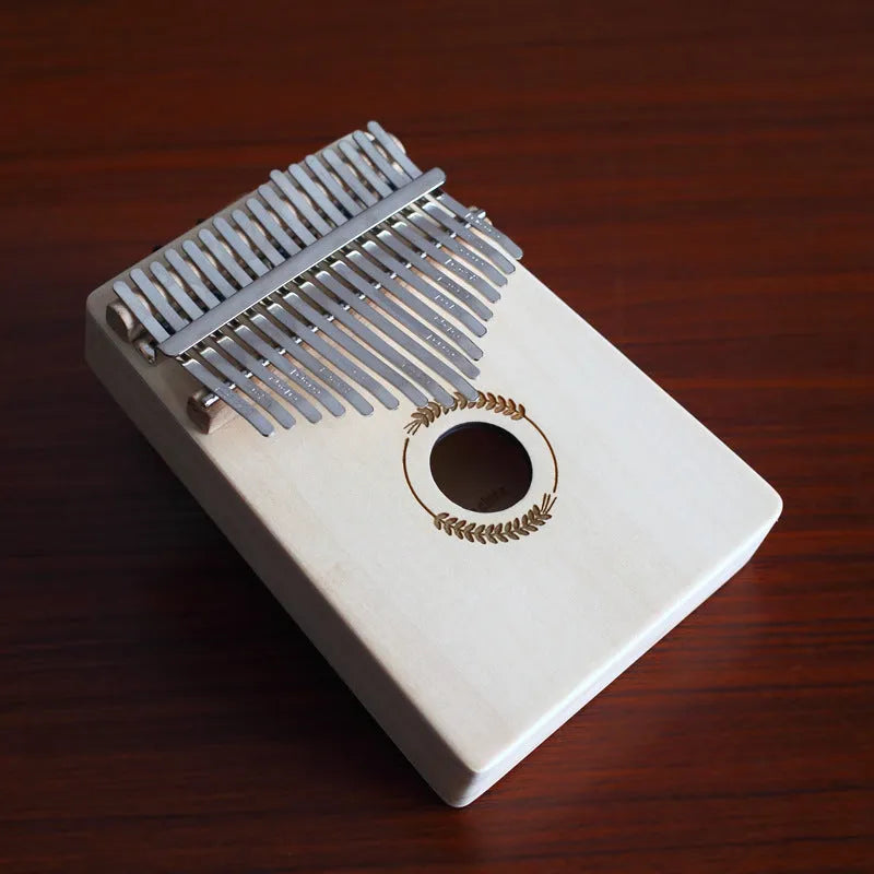 Basswood beginner thumb piano kalimba with no-lacquer finish, available in seven styles including Clouds and Gothic.