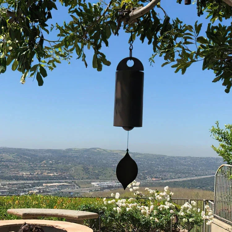 Elegant iron wind chimes in black and brown colors, designed for decorative garden and outdoor use