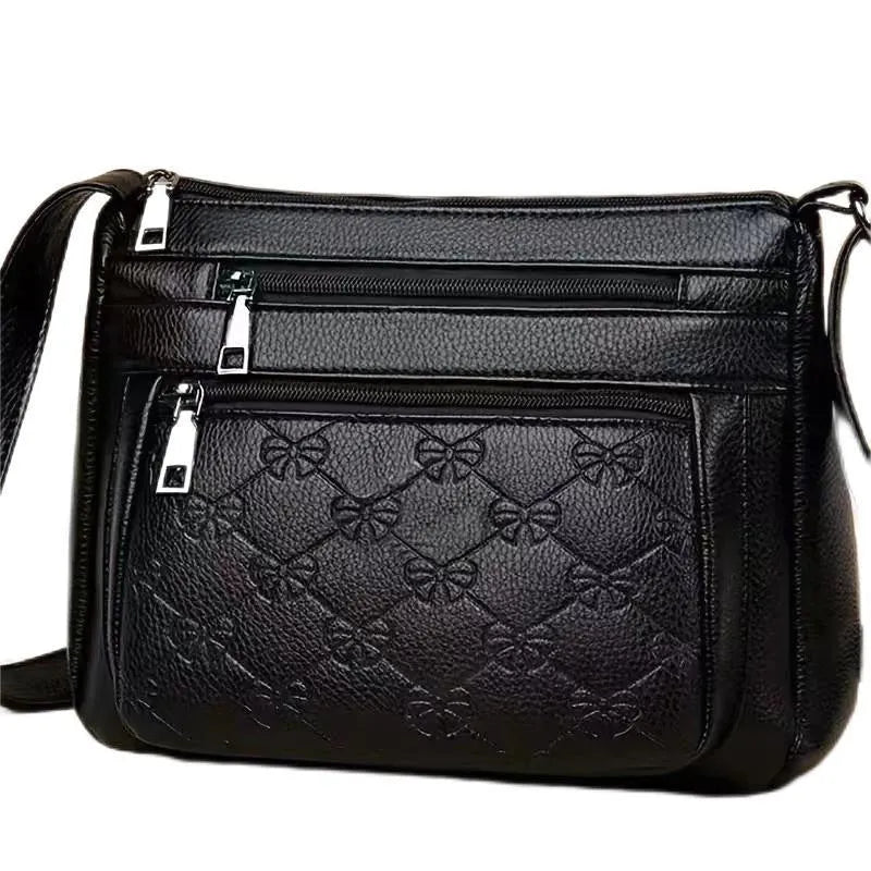 Butterfly black women's crossbody bag with horizontal square shape, slit pocket, and embossed PU detail