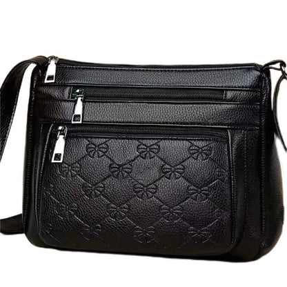 Butterfly black women's crossbody bag with horizontal square shape, slit pocket, and embossed PU detail