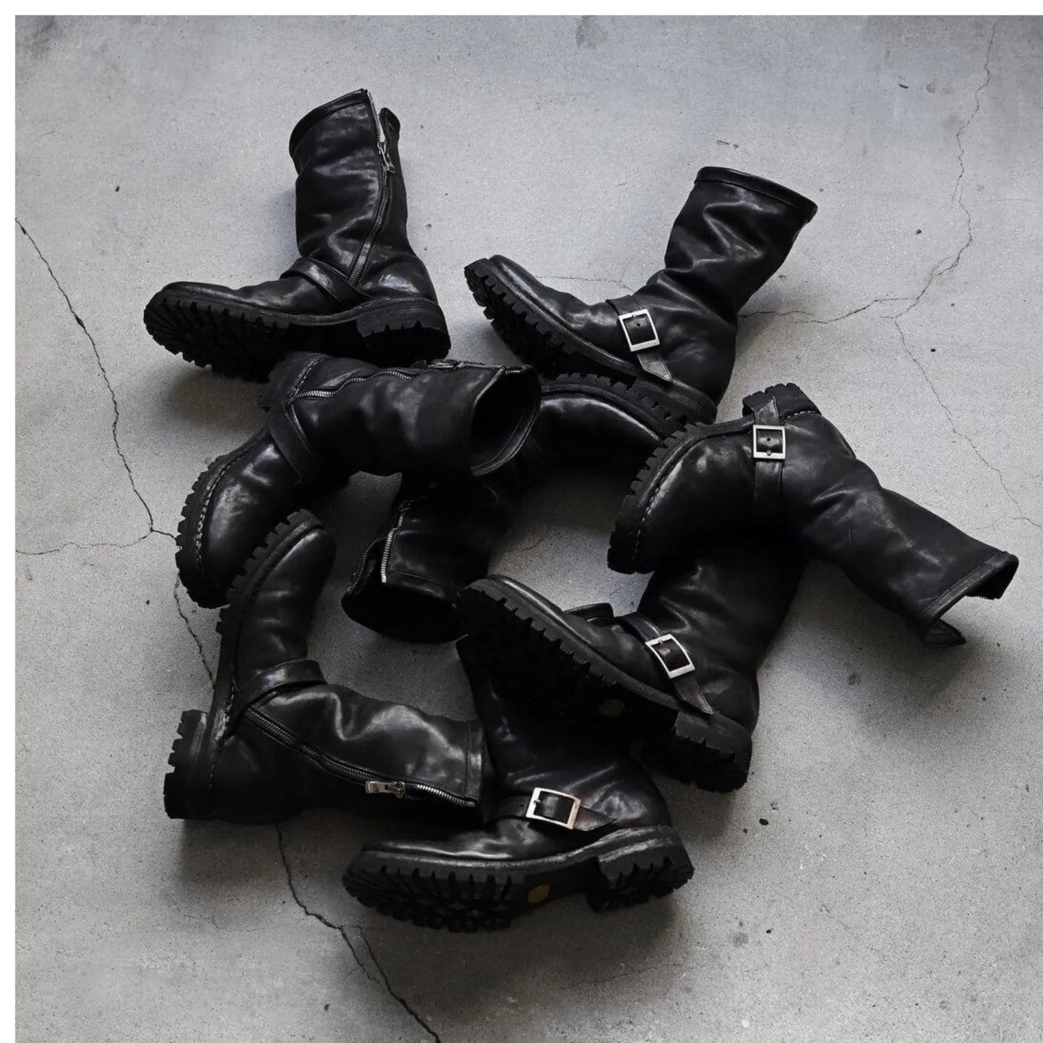 Men's black retro Martin ankle boots with a side zip fastener.