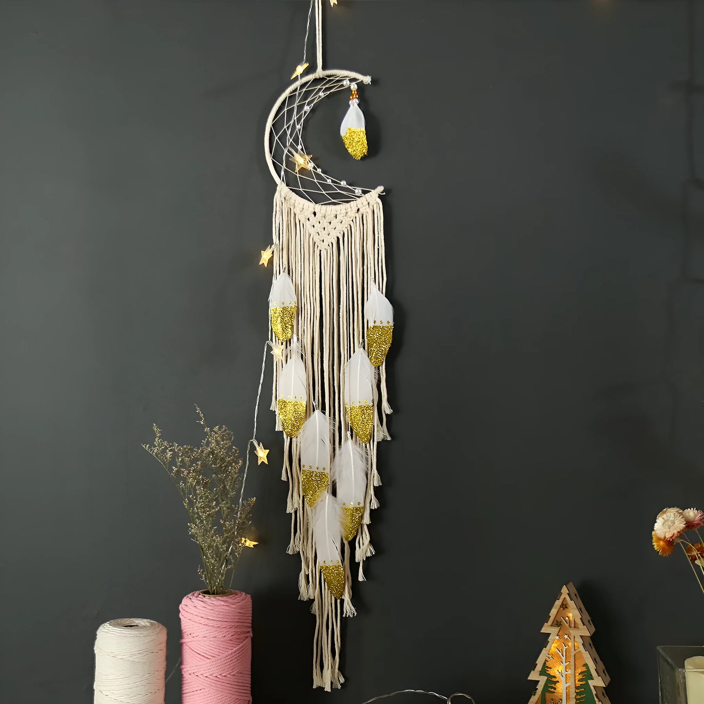 Gold crescent dream catcher wall decoration made from woven cotton thread, 20cm wide by 100cm high.