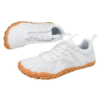 Climbing shoes with Flyknit lining and a rubber sole in A83 colour options on a climbing hold.