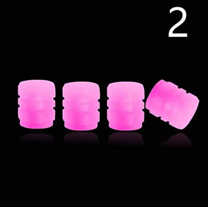 Glow-in-the-dark rubber tyre valve caps in five colour options on tyre valve stem