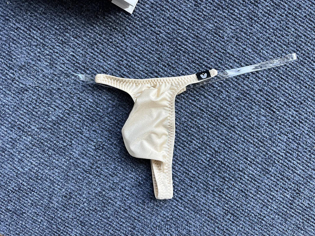 Invisible transparent belt low waist pouch underpants in nylon, T-back style, available in six colours and sizes M to XXL