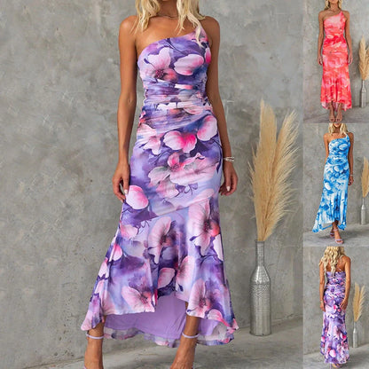 Elegant floral one-shoulder summer dress with suspender detail in vibrant colours