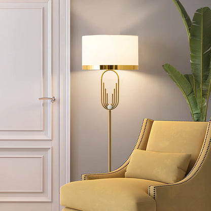Modern vertical floor lamp with adjustable height and fabric shade for reading and desk work