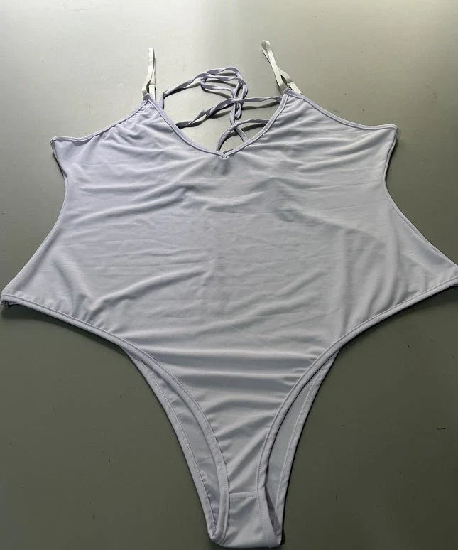 A stylish, backless one-piece swimsuit in a variety of vibrant colors for women's summer fashion.