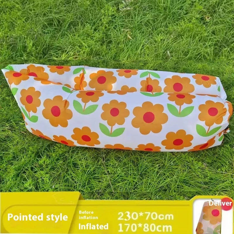 Yellow smiling face pattern inflatable portable seat for outdoor use