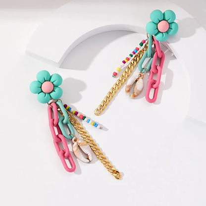 Handmade bohemian shell tassel earrings for women with colourful flower and geometric drop design