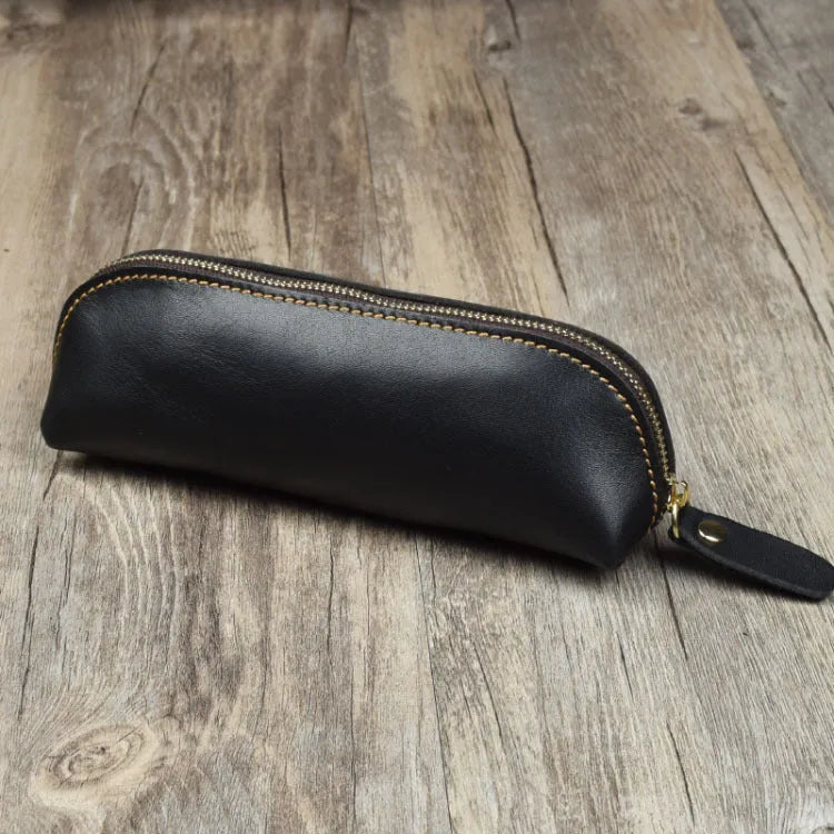 Square leather pencil case in genuine cowhide measuring 18cm with zipper closure