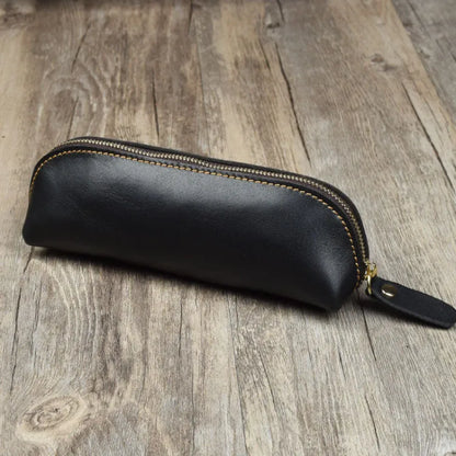 Square leather pencil case in genuine cowhide measuring 18cm with zipper closure
