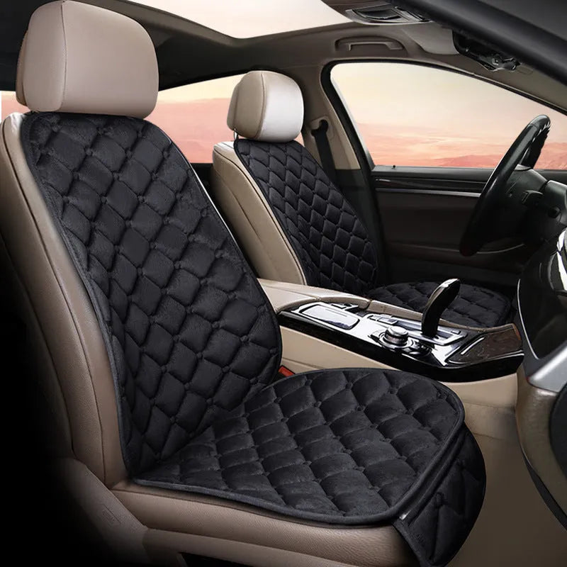 Ringer plush cotton car seat cushion in burgundy colour on a car seat.