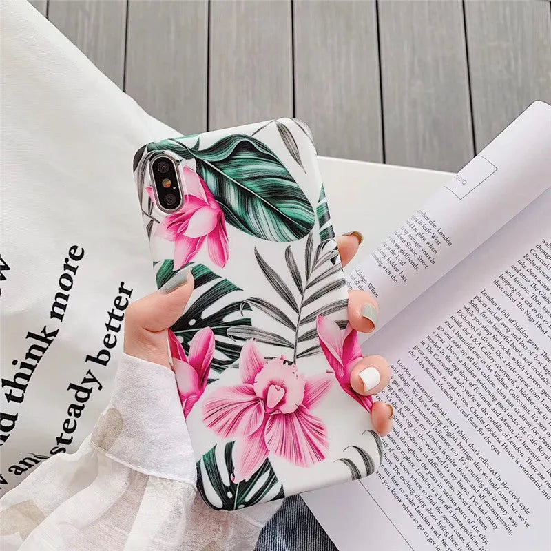 Pink floral print TPU back cover case for iPhone models 6 through 11 Pro Max.
