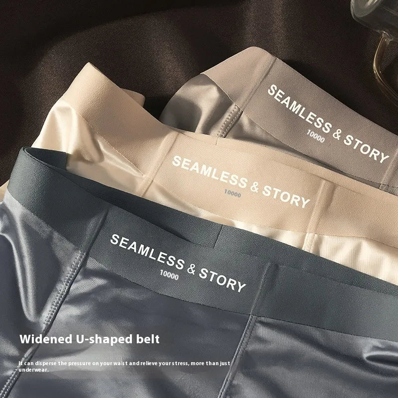 Men's solid colour satin ice silk boxer shorts laid flat, showing mid-waist design.