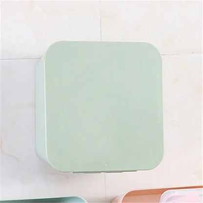 Wall-mounted PP storage box with non-marking stickers in Nordic blue, green, or pink.