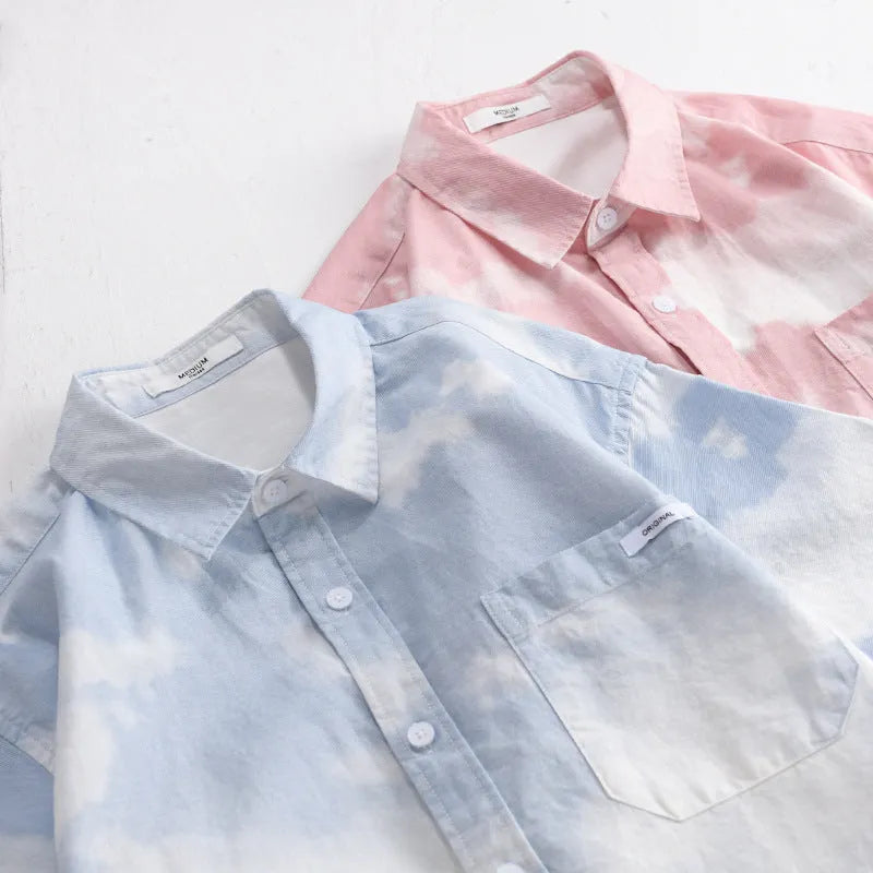 Man wearing a light pink loose-fit pure cotton short sleeve casual shirt.